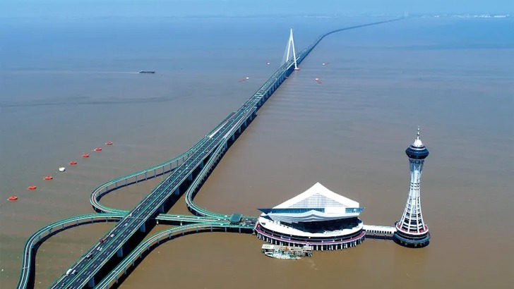 A picture containing water, boat, nature, shore
Description automatically generated